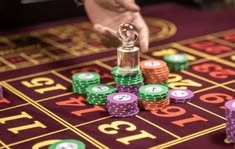 Ozwin Casino casino presented on mobile device in Pakistan with slots and live games