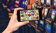 Ozwin Casino casino presented on mobile device in Pakistan with slots and live games